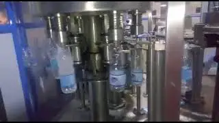LOW BUDGET WATER FILLING MACHINE MODEL KCE ( 6-6-3) WITH CAP ELEAVATOR HOPPER AND PANNEL