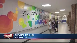 Students welcomed back to school with 100-foot mural