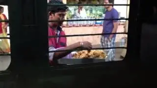 Vendor at train station, Londa Junction.