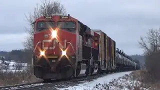 A Pair of Gevos Lead Freight Train CN 594 West pass McCully, NB at Track Speed