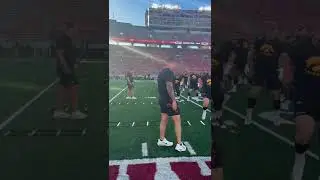 Iowa football QB Mark Gronowski warms up with a left knee brace before Wisconsin game