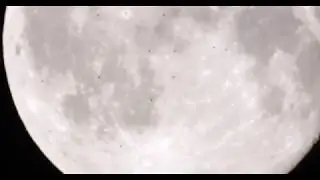 Birds crossing the moon, Rome Italy 072918