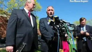 Chris Plaskon's attorneys Edward Gavin (left) and Richard Meehan, Jr., speak with the media outside