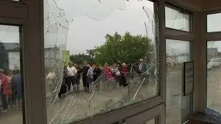 Some flee, others head home at Ukraine-Russia border crossing