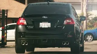 Fixing a low-hanging exhaust on a WRX