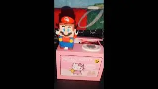 SATISFYING HELLO KITTY AUTOMATIC COIN BANK