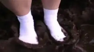 Extremely Muddy White Socks and Bare feet