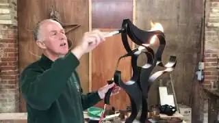 Waxing a bronze sculpture
