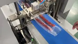 Vacuum flow wrap machine/vacuum horizontal flowpack machine/horizontal packaging machine