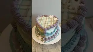 Loving this color combo 🩵❄️💜 #wintercake #heartcake #cakedecorating #vintagecake #buttercream