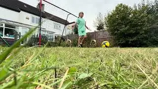 Garden goalkeeping practise with Dad