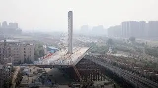 China's longest swing bridge rotates into completion in Wuhan