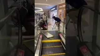 Shattered Mirror Triggers Wheelchair Escalator Disaster in Mall