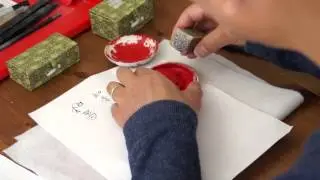 Henry Carving an Artist Mood Seal for Master DeVore