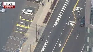Police search for female suspect after man seriously injured in shooting