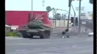 I put coconut mall music over some guy driving a tank around town