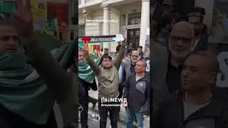 Indian protesters wave 