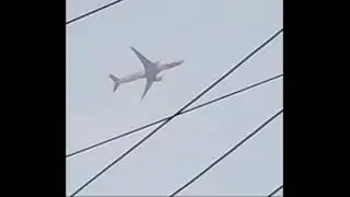 Plane fly over city|Plane so close passing