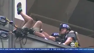 Man Scales Trump Tower