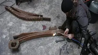 Salvaging leaf springs from a semi truck for sword smithing.