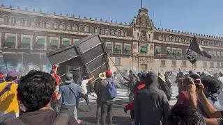 Protesters Take Down Part of Barrier Wall Outside National Palace in Mexico City
