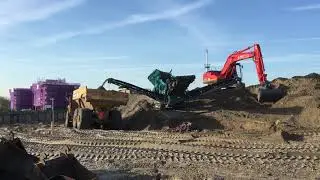 Warrior 1200 schudzeef zand aan het zeven