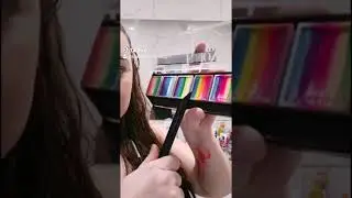 Pretty side butterfly with neon uv face paint