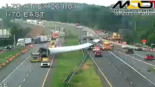 Wind turbine blade slides off semi, shuts down highway | VIDEO