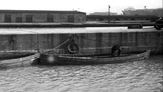 Life boats and survivor of the sinking of the SS Sand Merchant in Lake Erie. HD Stock Footage