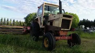 Case 870 cutting hay, and 70Q loader install