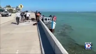 Group of Cuban migrants come ashore in Key West