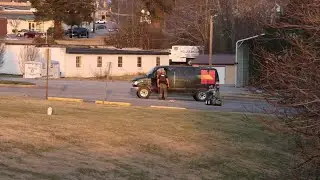 Gaston County bomb squad members search a van at Alexander County church