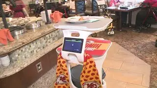 Robots join wait staff at KC senior living community