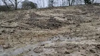 digging a pond with a dozer. WE GOT WATER!