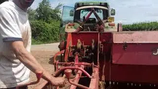 small baler knotters in action
