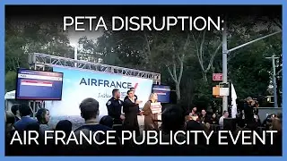 PETA Supporters Disrupt Air France Publicity Event to Protest Cruelty to Primates