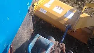 Tarter 6' rototiller on 35hp non live pto tractor.