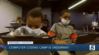 Children learn computer coding and app design at camp