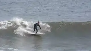 Goofy Footed Surfer on a Head High Wave at Chicama, Peru