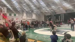 Natrona County's Drew Wright caps the Mustangs' 41-33 victory over Kelly Walsh with a pin.