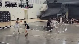 Donovin Londono.  John A Ferguson senior high.  Sophomore season highlight.  #23 White jersey.