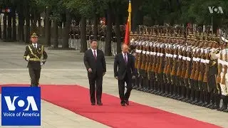 Xi Welcomes Putin