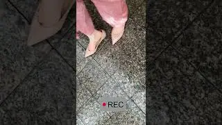 A woman takes off her #balletflats in the rain outside #asmr