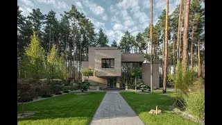 Bst House by 33bY Architecture, a modern brick cladding home in the woods