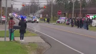 Napoleon community holds procession for officer who died in line of duty
