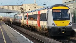 EMR 170419 and 170206 departing Peterborough platform 1 for Liverpool 