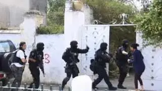 Tunisian soldier opens fire on troops at Tunis base.