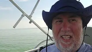 Welcome to Retirement Life. Hot day on the pontoon boat, glass water. At the sandbar. 