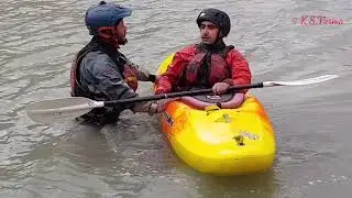 Learning Kayaking at Sangam Leh near Nimmu Village in Ladakh in Indus at its confluence with Zanskar