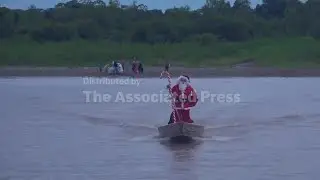 Santa Claus navigates through Brazil's Amazon delivering gifts and Christmas joy